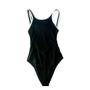 Reformation bodysuit. Black and white with low back and white detailing.